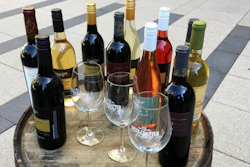 In the March 28, 2017 file photo, wines from the Next Chapter Winery, of New Prague, MN and Alexis Bailly Vineyard, of Hastings, MN are displayed at a news conference outside the federal courthouse in Minneapolis.