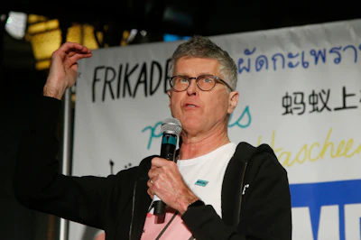 In this Jan. 6, 2020 file photo, Dr. Patrick Brown, founder and CEO of Impossible Foods, unveils Impossible Pork and Impossible Sausage during a news conference before the CES tech show in Las Vegas.