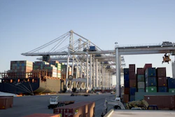Cranes at the Port of Savannah, Ga., load and unload containers, Jan. 30, 2018.