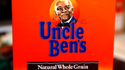 The portrait of 'Uncle Ben's' is portrayed on a box of rice Thursday, June 18, 2020 in Jackson, Miss. The Uncle Ben's rice brand is getting a new name: Ben's Original. Parent firm Mars Inc. unveiled the change Wednesday, Sept. 23, 2020 for the 70-year-old brand, the latest company to drop a logo criticized as a racial stereotype. Packaging with the new name will hit stores next year.