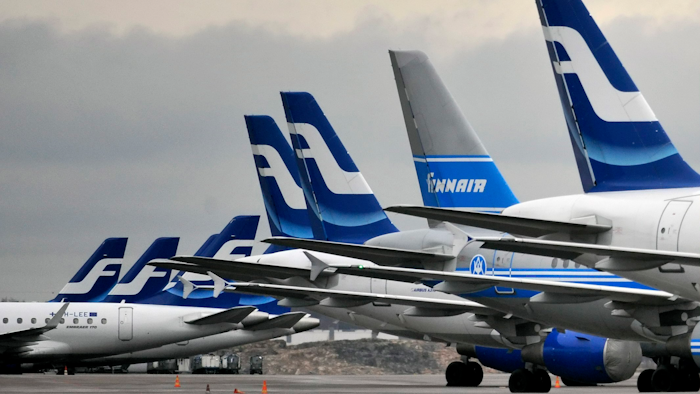 In this Nov. 16, 2009 file photo, passenger planes of the Finnish national airline company Finnair stand on the tarmac at Helsinki international airport, Helsinki.