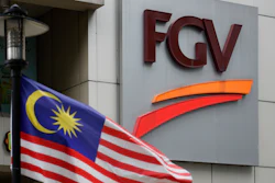 A Malaysian national flag is on display outside FGV Holdings Berhad, one of Malaysia's largest palm oil companies, in Kuala Lumpur on Thursday, Oct. 1.