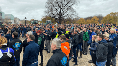 Dutch farmers gather to listen to speeches during a demonstration in The Hague, Netherlands on Tuesday, Nov. 17.