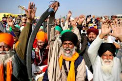 Protesting farmer leaders shout slogans as they sit on a day-long hunger strike at the Delhi- Haryana border on outskirts of New Delhi on Monday, Dec.14.