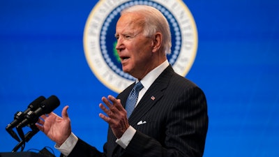 President Joe Biden answers questions from reporters in the South Court Auditorium on the White House complex, Jan. 25, 2021.