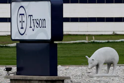 In this May 1, 2020 photo, a sign sits in front of the Tyson Foods plant in Waterloo, IA.