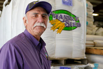 Adrian Polansky, a farmer and former executive director of the USDA’s Farm Service Agency office in Kansas during the Obama administration, stops for a photo while touring his seed processing plant near Belleville, KS on Friday, March 5.