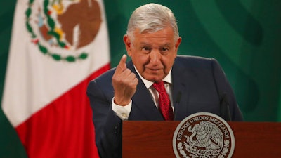 Mexican President Andrés Manuel López Obrador gives his daily morning press conference at the National Palace with the presence of the visiting Bolivian President Luis Arce in Mexico City, on March 24