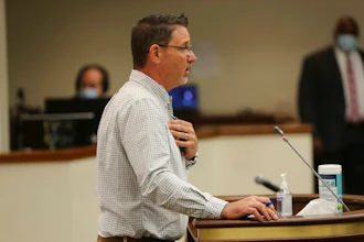 South Bend Winery owner Larry Cozine testifies about a bill allowing wine giant E & J Gallo Winery to open wine tasting rooms as part of building a new $400 million bottling plant and distribution center in South Carolina on Thursday, April 22, 2021, in Columbia, S.C. Cozine recently opened his winery in Greenwood, South Carolina.