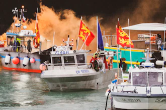 French fishermen angry over loss of access to waters off their coast gathered their boats in protest off the English Channel island of Jersey on Thursday, May 6.