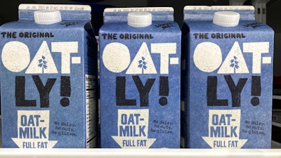 Oatly containers are displayed at a grocery store on May 18 in North Miami, Fla.