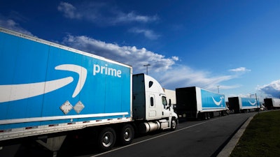 Amazon tractor-trailers outside an Amazon Fulfillment Center, Staten Island, New York, April 21, 2020.