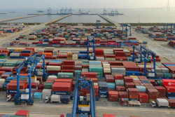 In this April 8, 2021 file photo, a container port on the Yangtze River is seen in an aerial view in Nantong in eastern China's Jiangsu province.