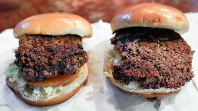 Does being told that a veggie burger, like the one on the right, is better for the environment make you more likely to choose it over beef?
