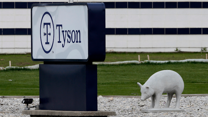 In this May 1, 2020 photo, a sign sits in front of the Tyson Foods plant in Waterloo, IA.