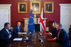 Britain's Minister for the Cabinet Office of the United Kingdom, David Frost, right, speaks to his EU counterpart Maros Sefcovic, during a meeting, in London on June 9.