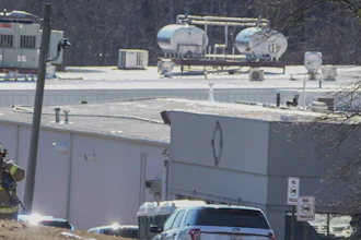 A Hall County firefighter leaves following a liquid nitrogen leak that killed six people at Prime Pak Foods, a poultry plant, on Jan. 28 in Gainesville, GA.