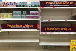 Empty shelves and signs in the soft drinks aisle of a Sainsbury's store in Rowley Regis, England, July 22, 2021.