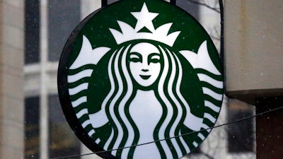 This March 14, 2017, file photo shows the Starbucks logo on a shop in downtown Pittsburgh.
