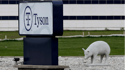 In this May 1, 2020 photo, a sign sits in front of the Tyson Foods plant in Waterloo, IA.