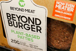 In this June 27, 2019 photo, a meatless burger patty called Beyond Burger made by Beyond Meat is displayed at a grocery store in Richmond, Va.