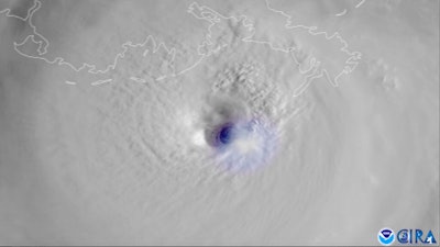 This satellite image provided by the National Oceanic and Atmospheric Administration and captured by NOAA's GOES-16 shows lightning swirling around the eye of Hurricane Ida as the storm approaches the Louisiana coast on the morning of Aug. 29.