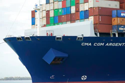 In this April 6, 2021 photo, crew members stand on the bow as the CMA CGM Argentina arrives at PortMiami, the largest container ship to call at a Florida port in Miami. Importers are contending with a perfect storm of supply trouble — rising prices, overwhelmed ports, a shortage of ships, trains, trucks — that is expected to last into 2022.