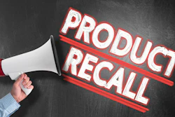 Hand Holding Megaphone Against Blackboard With Text Product Recall 1152595055 2252x1335
