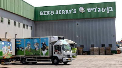 In this July 20, 2021 photo, trucks are parked at the Ben & Jerry's ice-cream factory in the Be'er Tuvia Industrial area in Israel.