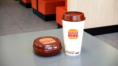 This photos provided by North America Public Relations shows a reusable packaging at a Burger King restaurant. Reusable packaging is about to become more common at groceries and restaurants worldwide. Loop, which collects and sanitizes reusable containers, said Wednesday, Sept. 22, 2021 it’s expanding after successful trials in France and Japan. Kroger and Walgreens in the U.S., and Tesco in the United Kingdom are among the groceries partnering with Loop. McDonald’s, Burger King and Tim Hortons have also signed on.