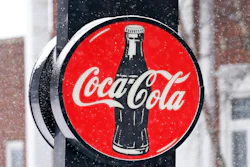 A Coca-Cola sign hangs outside a Coca-Cola distributo on Feb. 9, 2021 in Bedford, Ohio.