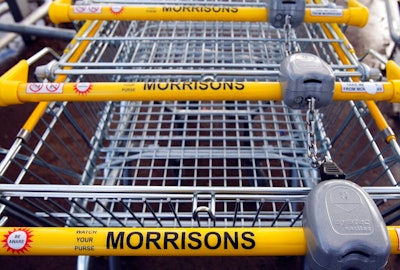 In this Thursday, Dec. 4, 2008 file photo, supermarket trolleys are seen outside a Morrisons supermarket in London. An American private equity group saw off a rival to narrowly win the battle to buy British supermarket chain Morrisons following a dramatic auction for the company. Britain's Takeover Panel said Saturday that New York-based Clayton, Dubilier & Rice (CD&R) offered 287 pence for each Morrisons share, just a penny more than the offer from Fortress, which is backed by Japanese bank Softbank.