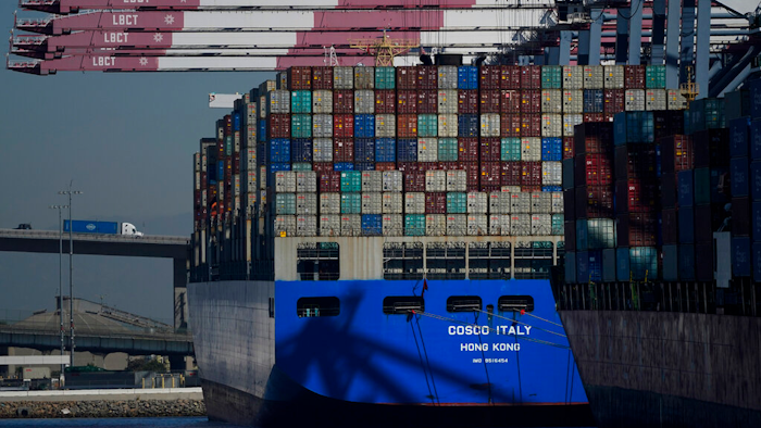 A Cosco container ship is docked at the Port of Long Beach in Long Beach, CA on Oct. 1, 2021.