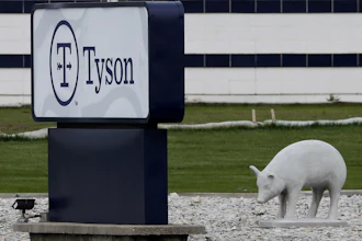 In this May 1, 2020 photo, a sign sits in front of the Tyson Foods plant in Waterloo, IA.