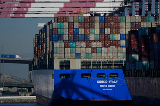 A Cosco container ship is docked at the Port of Long Beach in Long Beach, CA on Oct. 1, 2021.