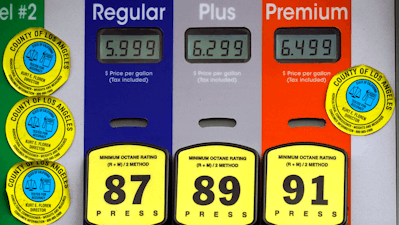 High gas prices are posted at a full service gas station in Beverly Hills, CA on Nov. 7, 2021.