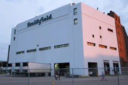 Employees of two departments at the Smithfield pork processing plant in Sioux Falls, S.D. report to work on May 4, 2020 as the plant moved to reopen after a coronavirus outbreak infected workers.