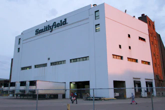 Employees of two departments at the Smithfield pork processing plant in Sioux Falls, S.D. report to work on May 4, 2020 as the plant moved to reopen after a coronavirus outbreak infected workers.