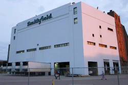 Employees of two departments at the Smithfield pork processing plant in Sioux Falls, S.D. report to work on May 4, 2020 as the plant moved to reopen after a coronavirus outbreak infected workers.
