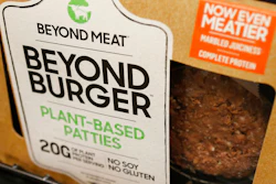 In this June 27, 2019 photo, a meatless burger patty called Beyond Burger made by Beyond Meat is displayed at a grocery store in Richmond, Va.