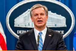 FBI Director Christopher Wray speaks at a news conference at the Justice Department in Washington, on Nov. 8, 2021. Wray says the threat to the West from the Chinese government is 'more brazen' and damaging than ever before. In a speech on Jan. 31, 2022, at the Reagan Presidential Library in California, Wray accused Beijing of stealing American ideas and innovation and launching massive hacking operations.