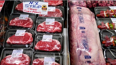 In this Tuesday, June 15, 2021 file photograph, beef is displayed in the meat department at Lambert's Rainbow Market, in Westwood, Mass. Wholesale inflation in the United States surged again last month, rising 9.7% from a year earlier in a sign that price pressures remain high at all levels of the economy. The Labor Department said Tuesday, Feb. 15, 2022, that its producer price index — which measures inflation before it reaches consumers — jumped 1% from December.