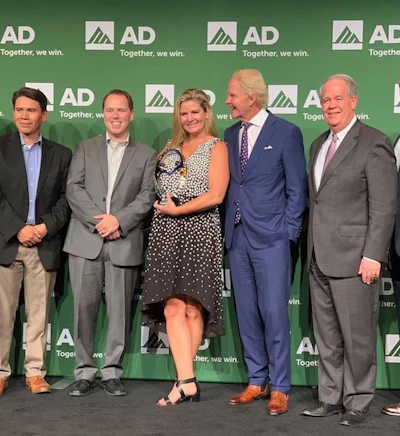 From Left: Industrial Supply Co.'s Ruben Mendez, Bob Evans, Jessica Yurgaitis, Phil Thompson and Chris Bateman pose after receiving AD's Giving Back award in October 2018.