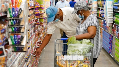 Ray Carter, left, and Bobbie Carter right, shop at the new Homeland grocery store on Sept. 1, 2021, in Oklahoma City.