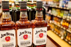 Shelves display bottles of bourbons for sale at a Pennsylvania fine wine and spirits store on Jan. 22, 2022, in Harmony, Pa.
