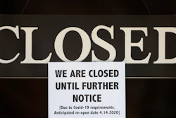Closure notice posted at The Great Frame Up in Grosse Pointe Woods, Mich., April 2, 2020.
