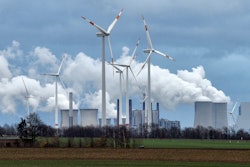 Wind generators in front of a coal-fired power plant near Jackerath, Germany, Dec. 7, 2018.