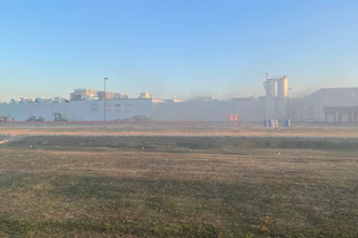 Smoke continues to linger March 17 after a fire at Nestle's prepared foods plant in Jonesboro, AR.