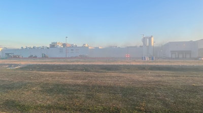 Smoke continues to linger March 17 after a fire at Nestle's prepared foods plant in Jonesboro, AR.
