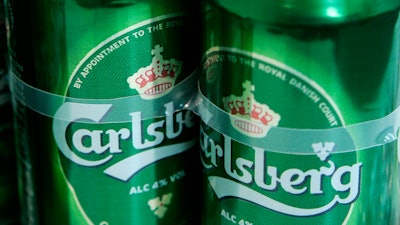 Carlsberg beer cans at a press conference in London, Jan. 25, 2008.